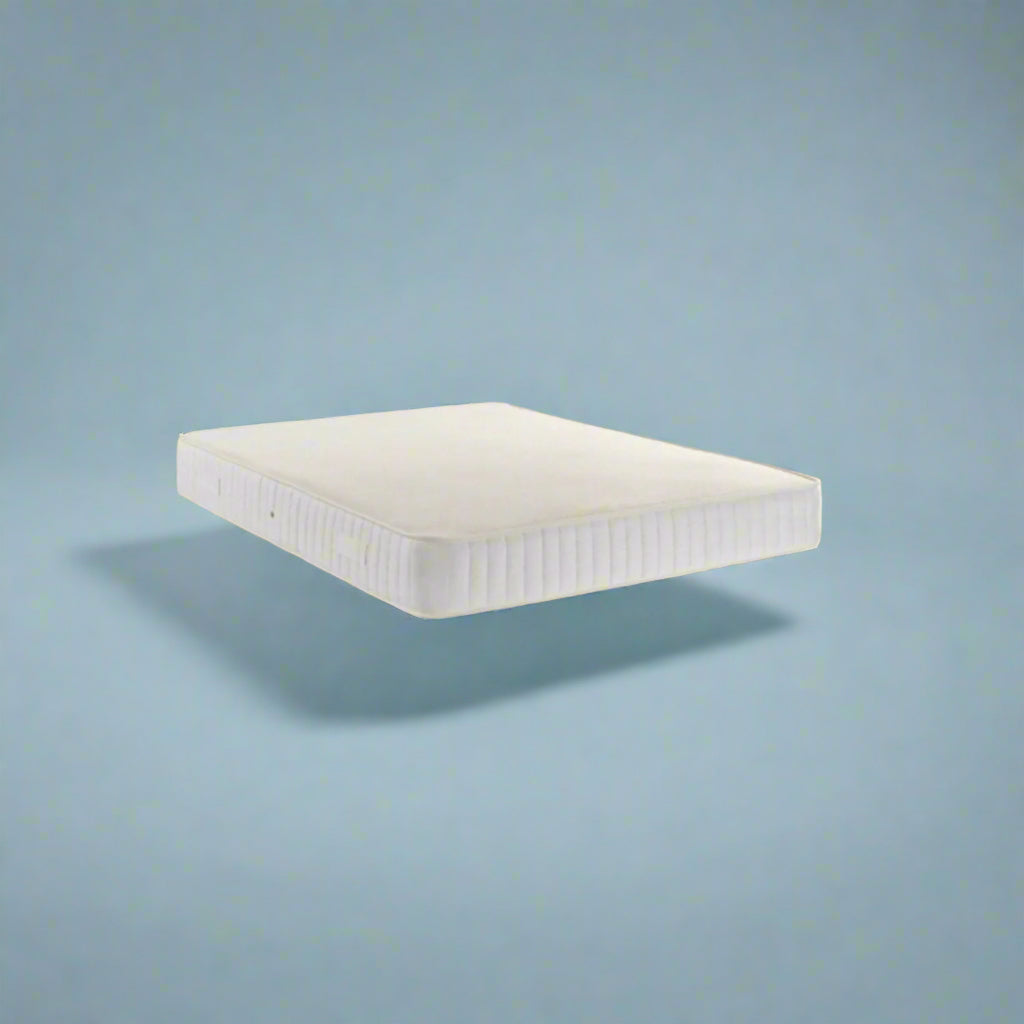 Dreamland Aleena Memory Foam With Spring Mattress - On a blue background - Beds4Us