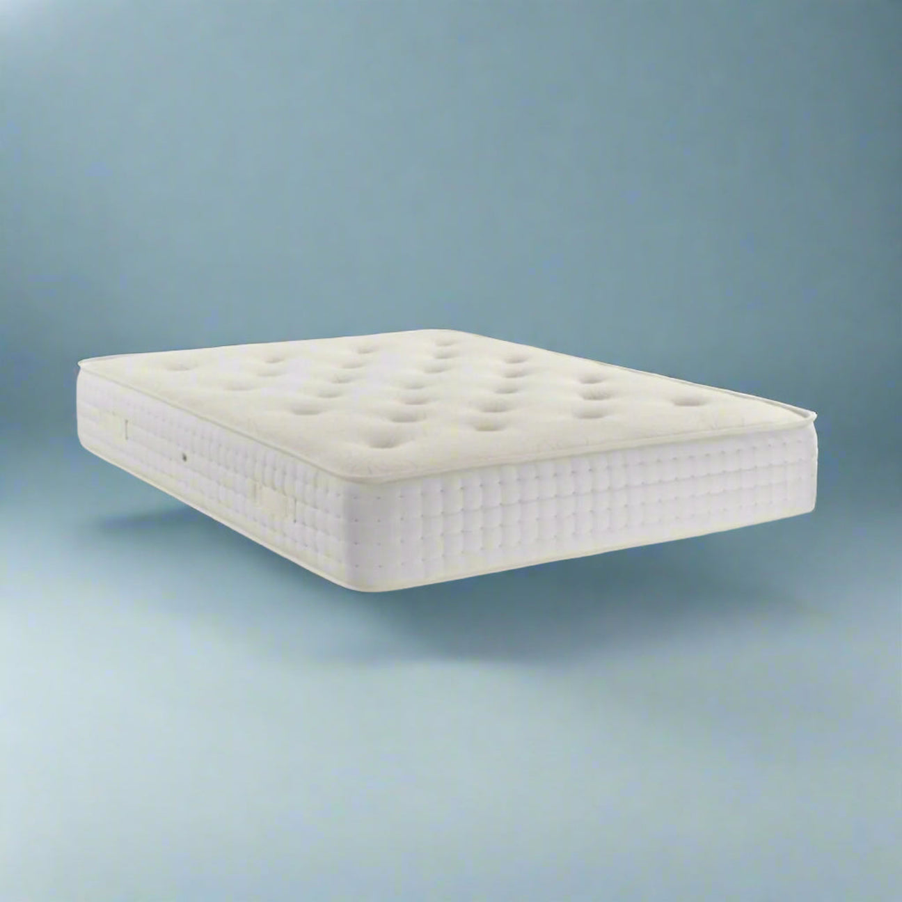 Dreamland Opulence 1500 Medium Firm Memory Foam Mattress - On a blue background - Beds4Us