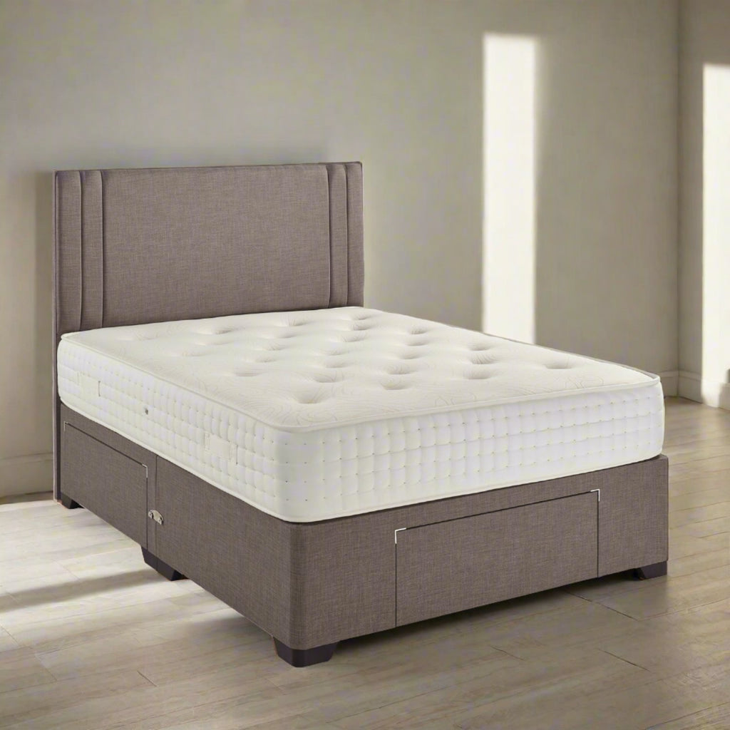 Dreamland Talaley Latex Pocket 2000 Mattress - On a bed base, in a plain room - Beds4Us