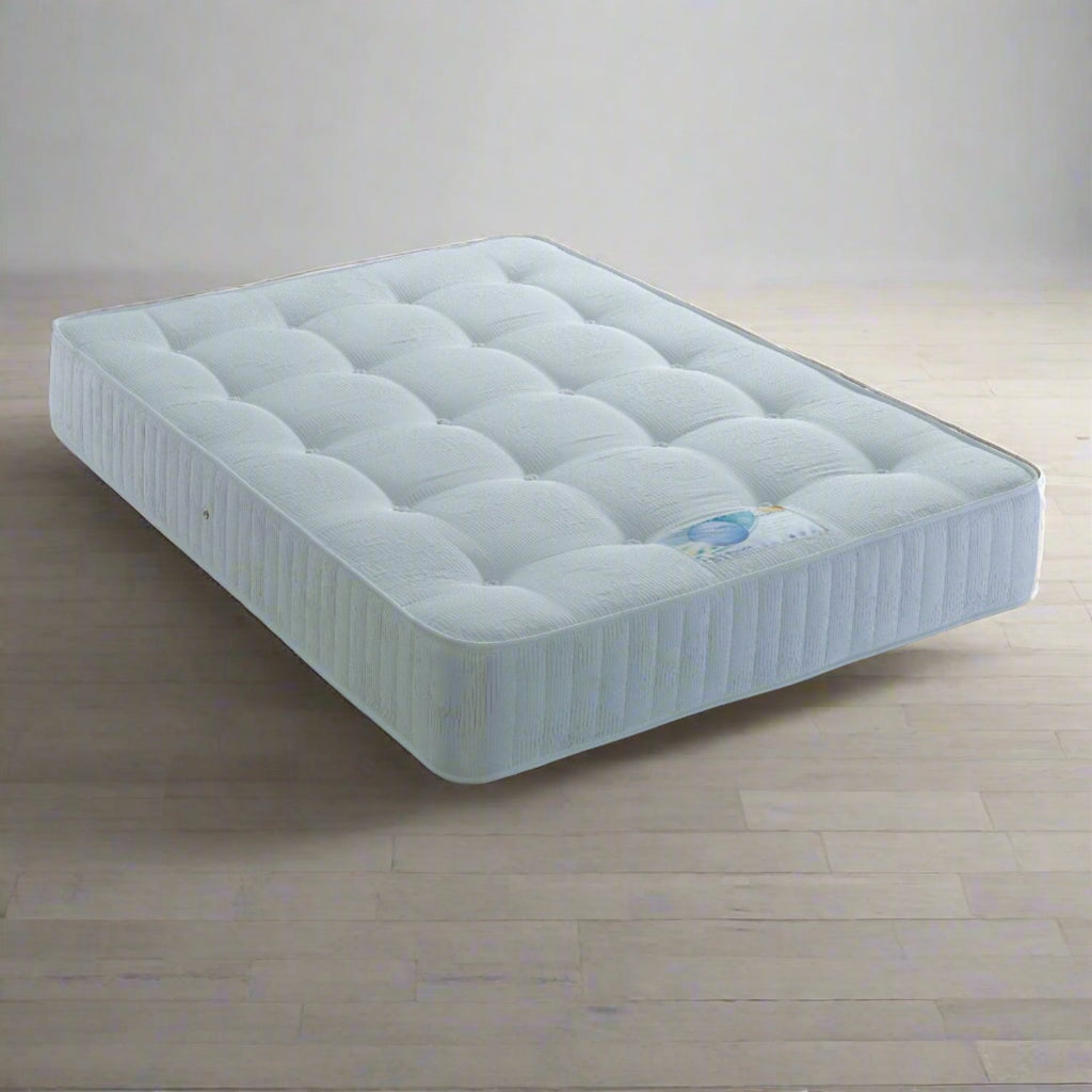 Dura Beds Ortho Perfection Affordable Firm Mattress - On a wooden floor background - Beds4Us