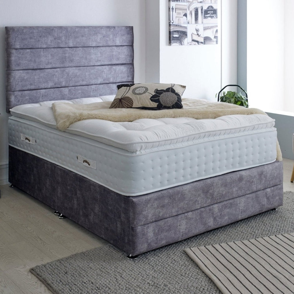 Heritage All Natural Platinum 6000 Mattress - On a grey bed in a bright room - Beds4Us