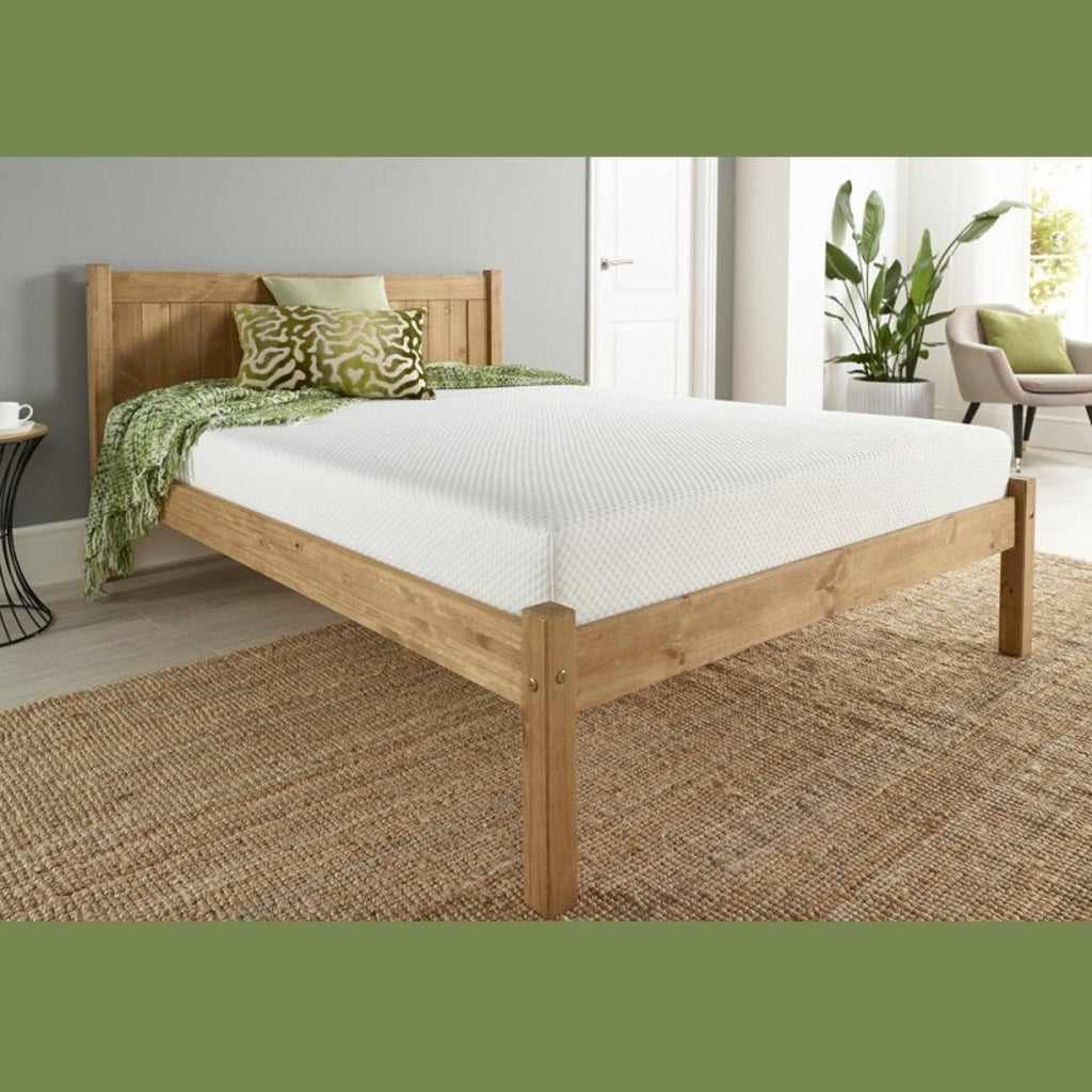 Komfi Rhea Carbon Neutral Superior Eco Mattress - Mattress on a wooden bed frame in a beige and grey bedroom - Beds4us