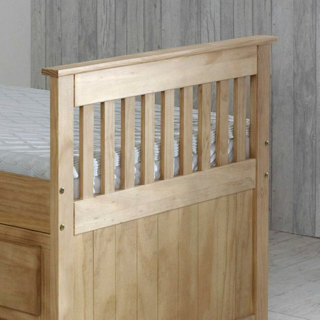 Captains Wooden Underbed Storage Bed - Close up of captain's bed footboard in waxed pine, positioned at an angle in a grey bedroom - Beds4Us