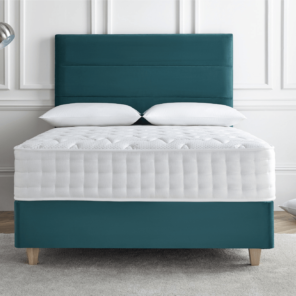 Deep Sleep 1000 Comfort Mattress - mattress on bed frame with headboard in pale cream room setting - Beds4Us