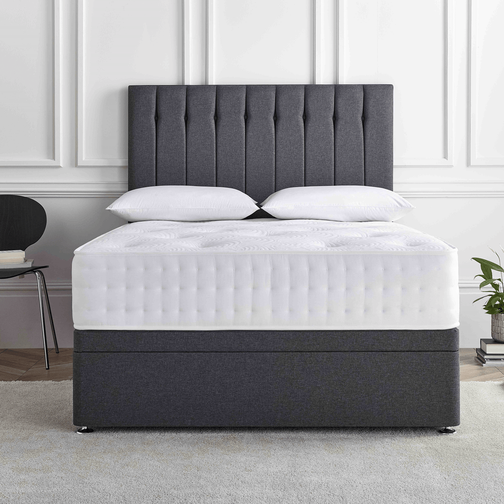 Deep Sleep Bronze 1500 Mattress - mattress on a divan base with headboard in a white room - Beds4Us