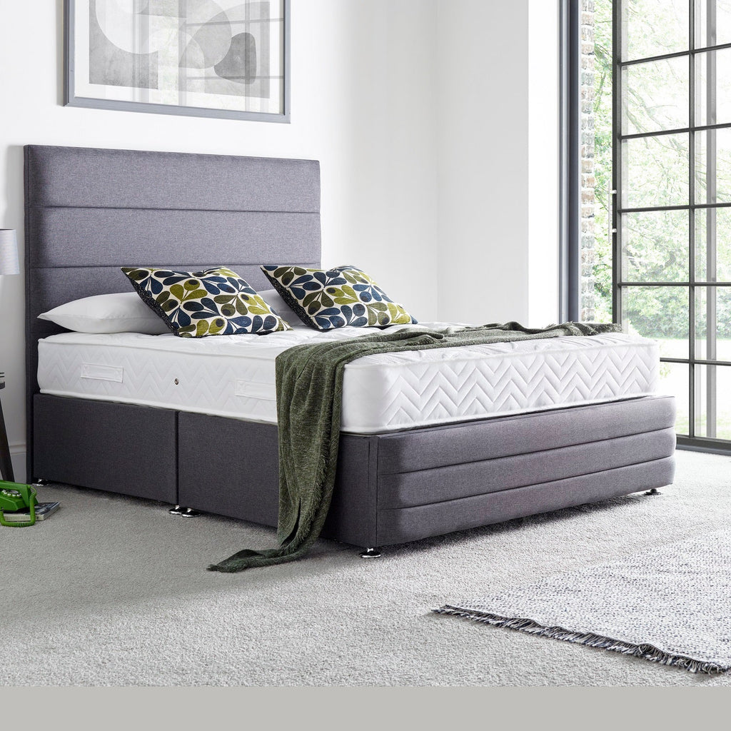 Deep Sleep Camberley Tencel Bonnell Spring Mattress - On a grey base in a modern room - Beds4us