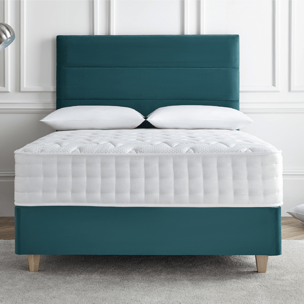 Deep Sleep Comfort 1000 Mattress - mattress on bed frame with headboard in pale cream room setting - Beds4Us