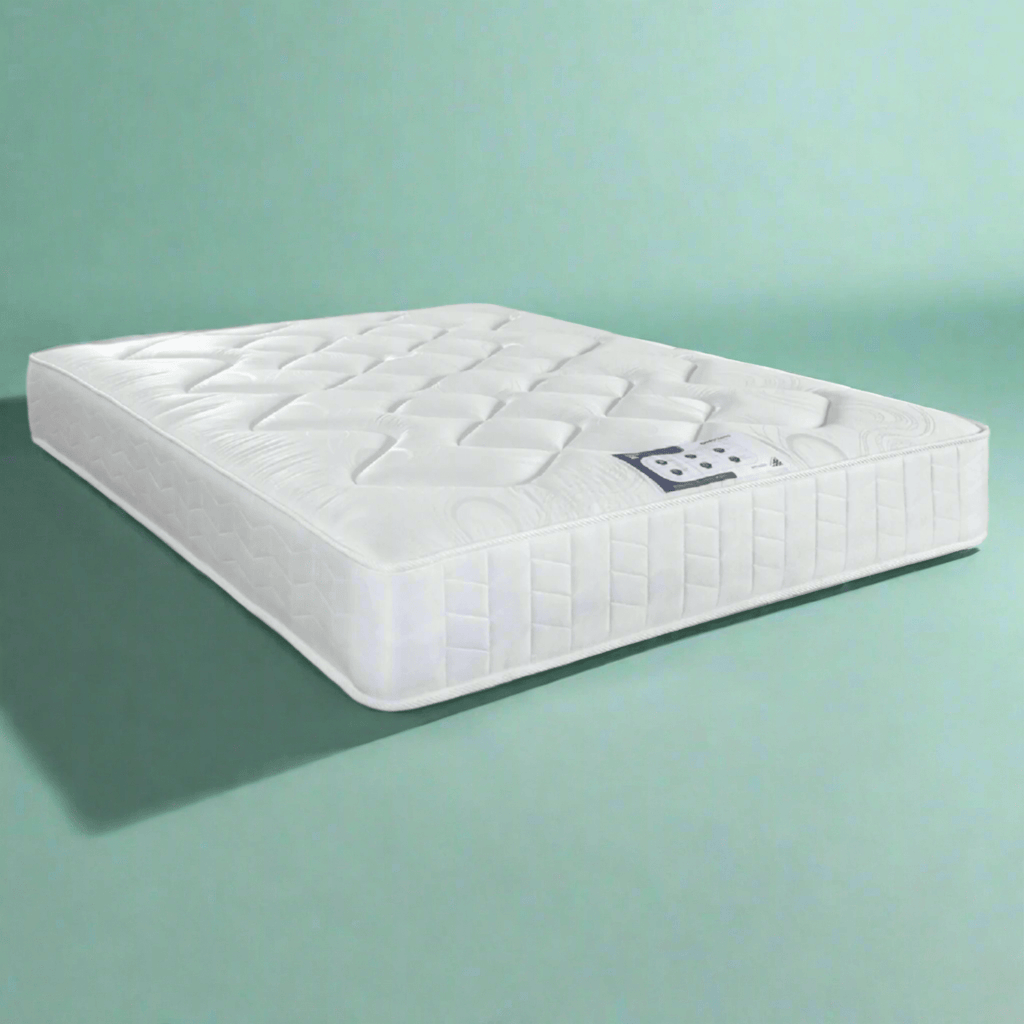 Deep Sleep Topaz Open Coil Mattress - mattress on green background - Beds4Us