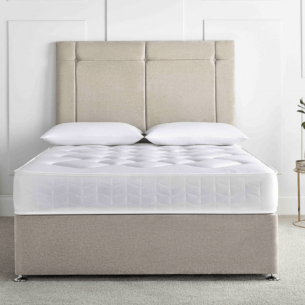 Deep Sleep Topaz Open Coil Mattress - mattress on divan base with headboard in light coloured room - Beds4Us