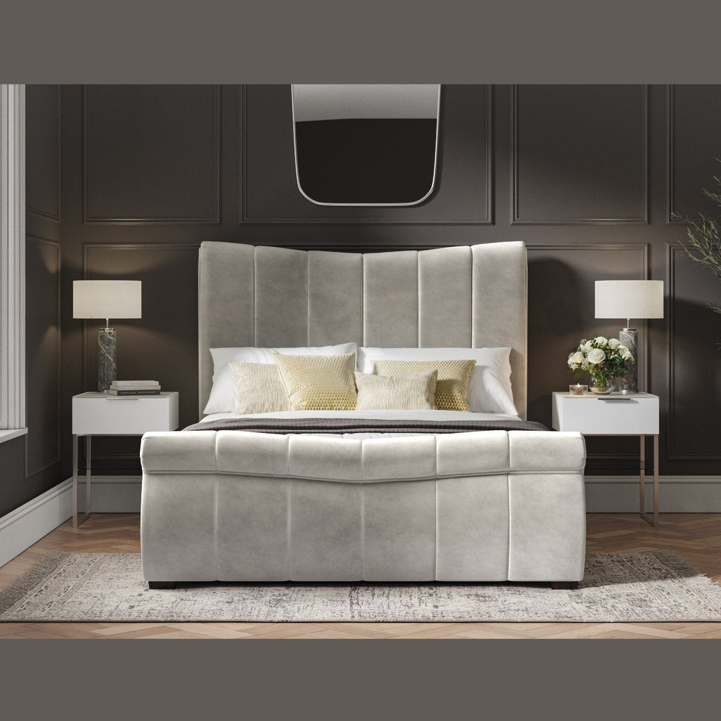 Bosworth Fabric Ottoman Storage Sleigh Bed  - Light grey sleigh ottoman bed frame positioned face on, in a dark modern room - Beds4Us