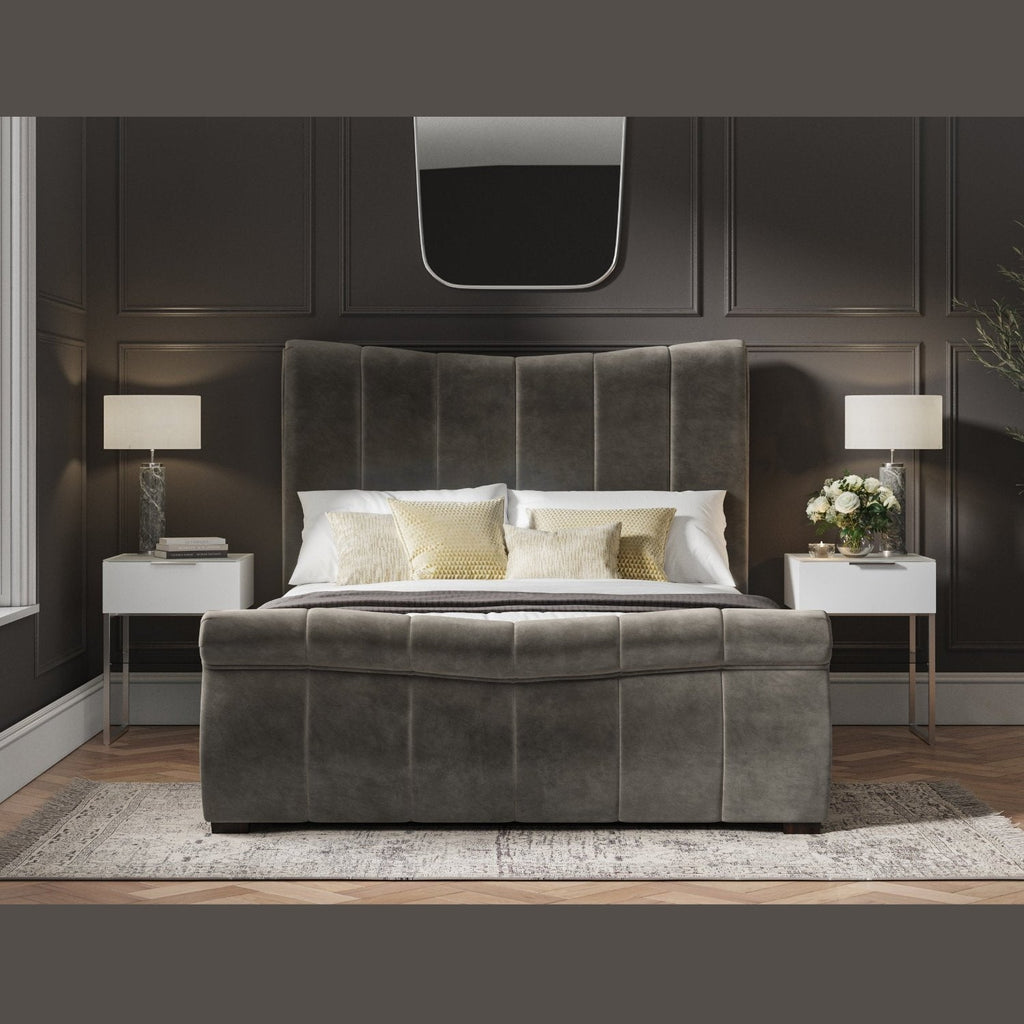 Bosworth Fabric Ottoman Storage Sleigh Bed  - Dark grey sleigh ottoman bed frame positioned face on, in a dark modern room - Beds4Us