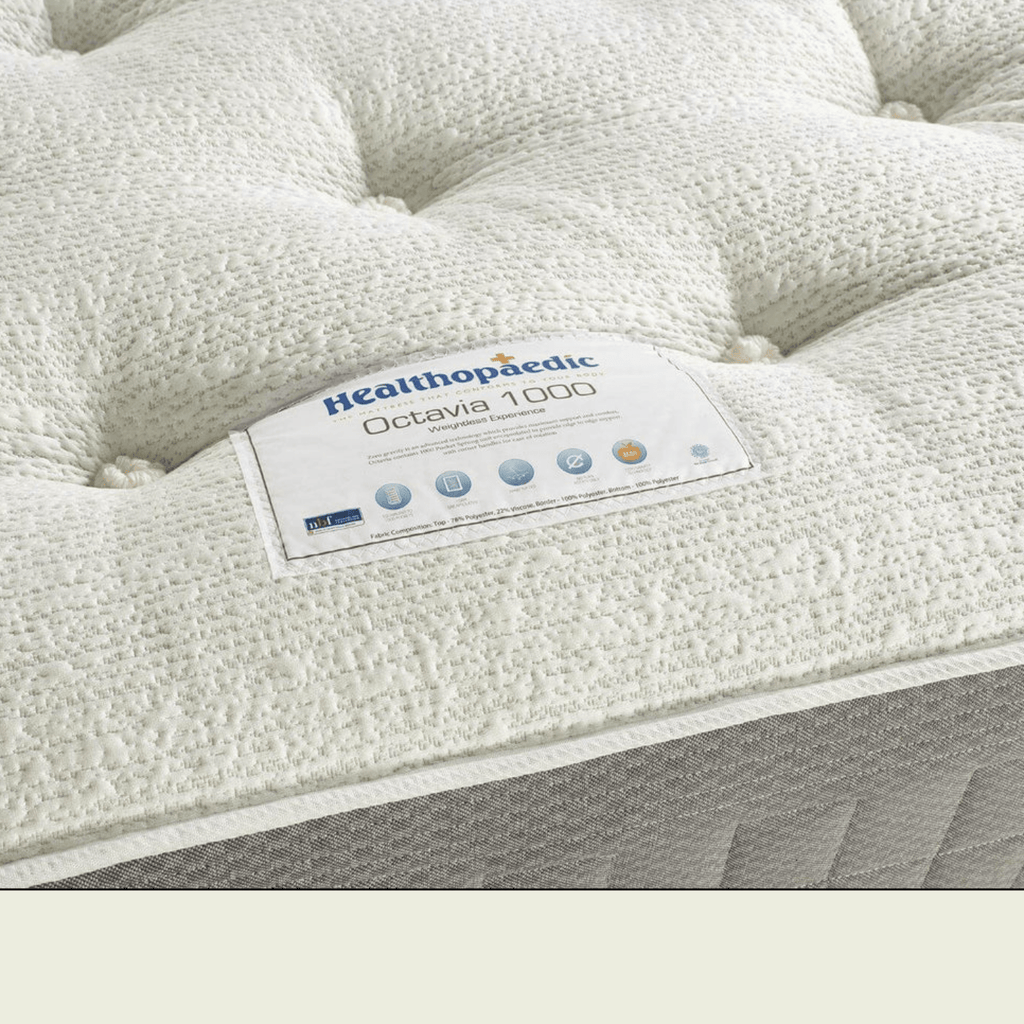 Healthopaedic Octavia Zero Gravity Memory Foam Pocket Mattress - Close up of mattress tufts and label - Beds4us