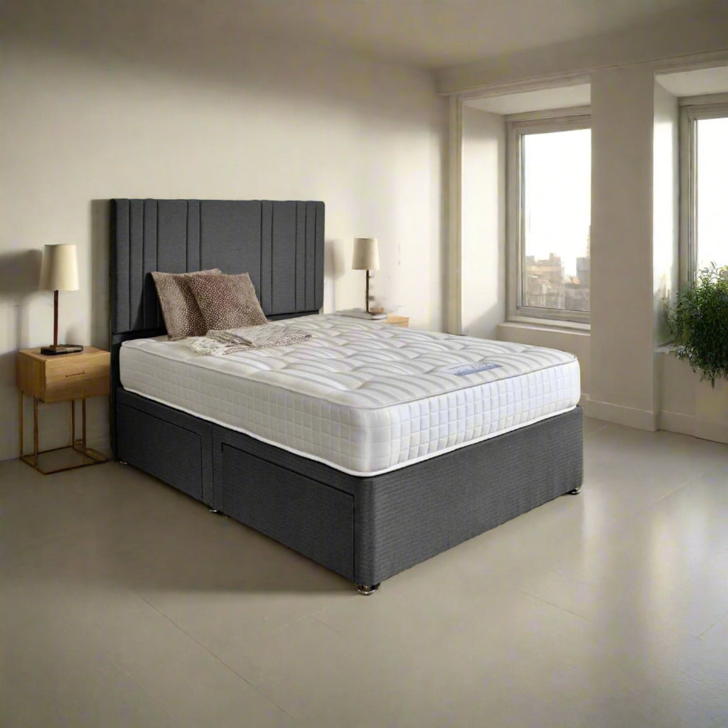 Shakespeare Beds Solid Comfort Mattress - mattress on bed with headboard in a bedroom setting - Beds4Us