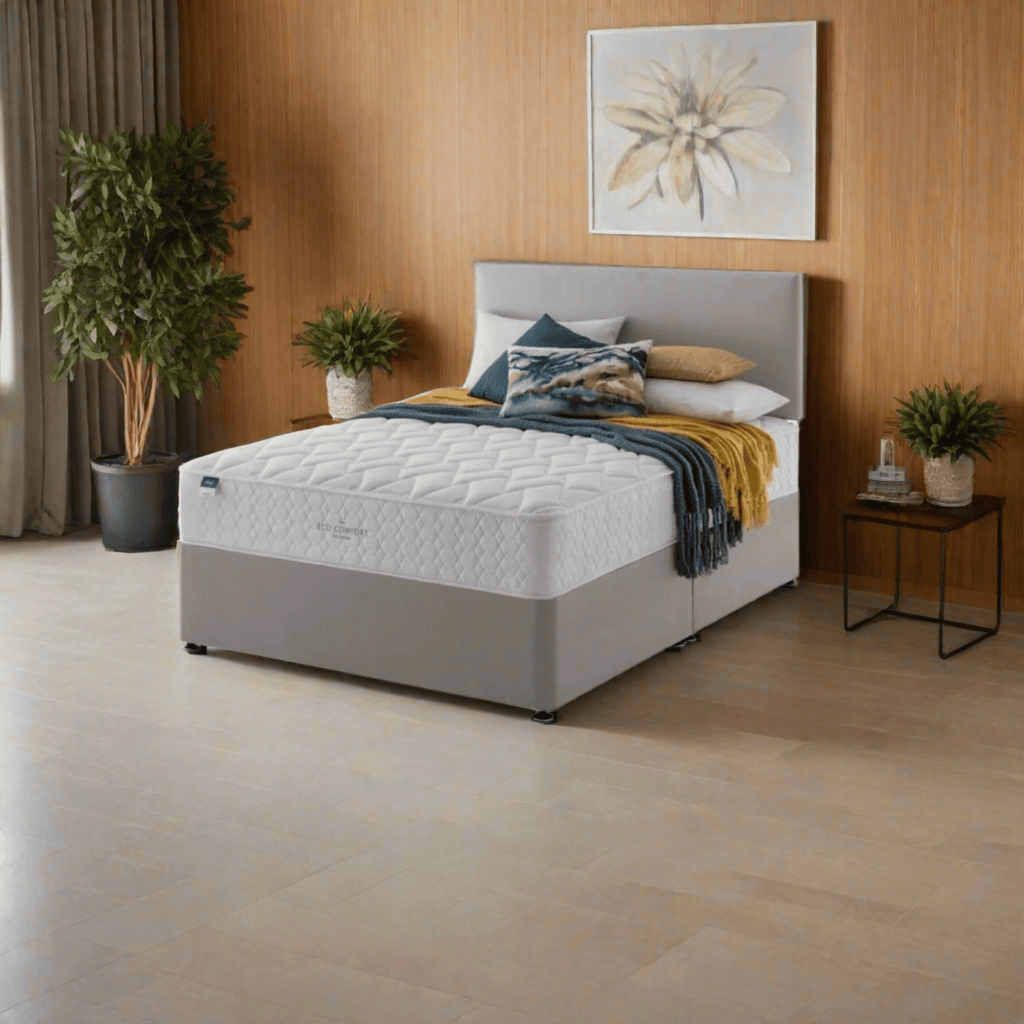 Silentnight Aide Miracoil Eco Comfort Mattress - Mattress on a bed in a modern bedroom, positioned at an angle - Beds4us