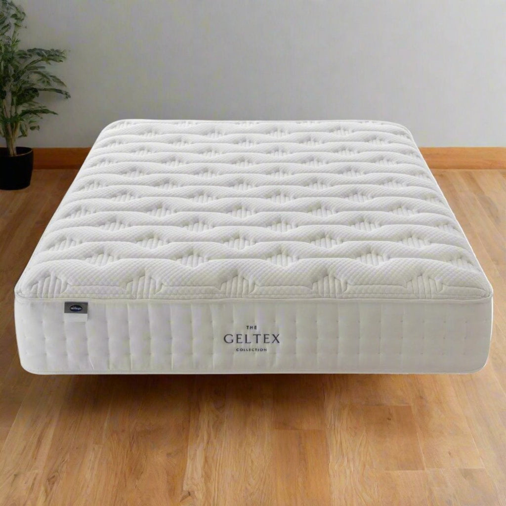 Silentnight Geltex Pocket 2000 mattres - Mattress floating above wooden floor in a modern room - Beds4Us