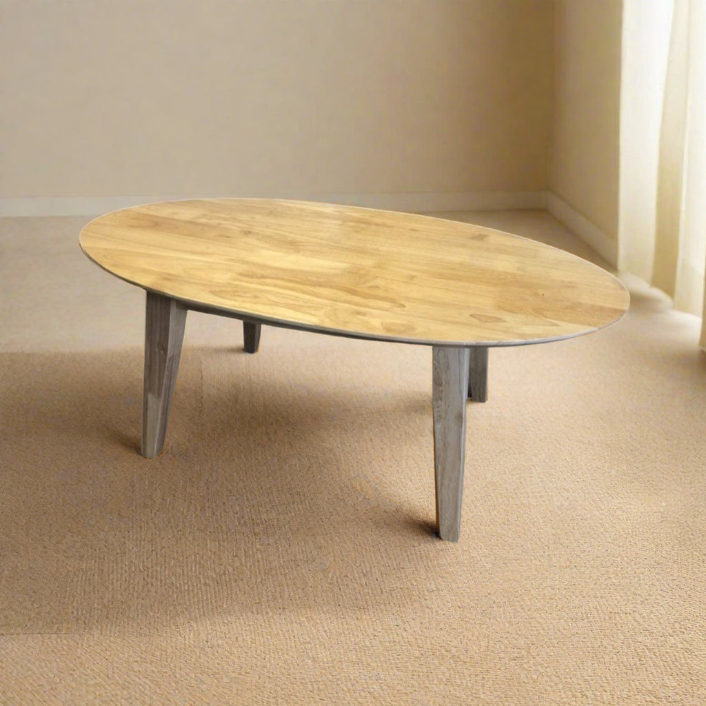 Wooden Oval Coffee Table - Solid wooden pine coffee table in a beige empty room- Beds4Us