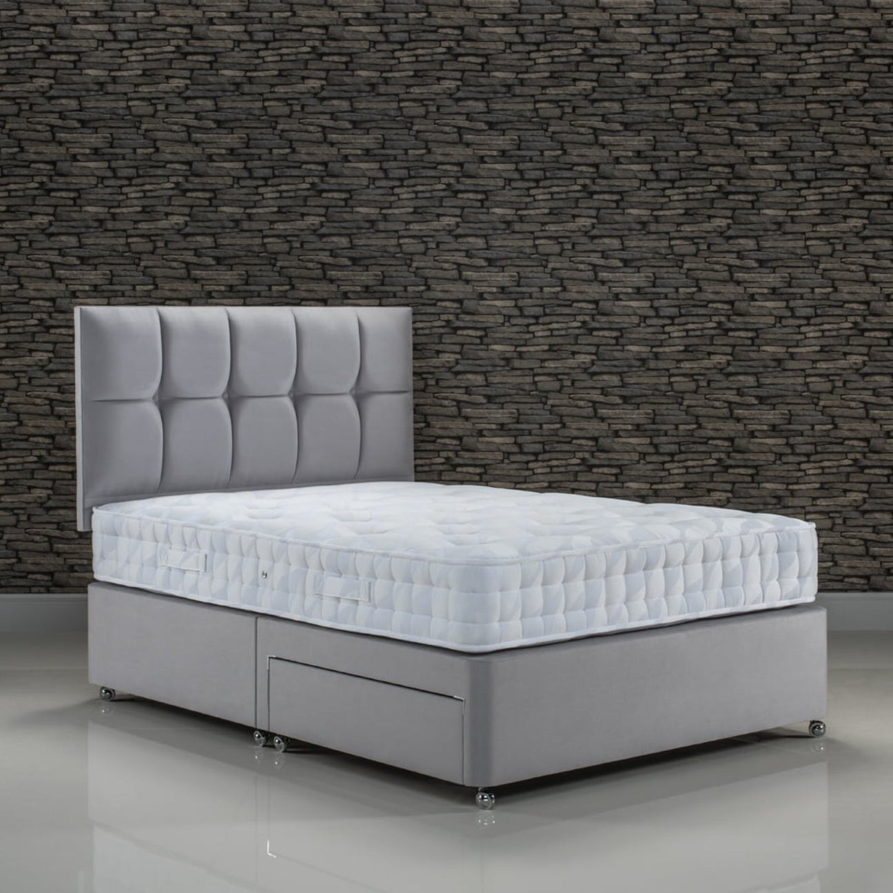 Old English Bed Co No Need To Turn 1000 Mattress - On a bed, in front of a stone wall - Beds4Us